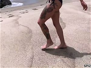 Anna Bell Peaks plumbing a phat hard-on on the beach